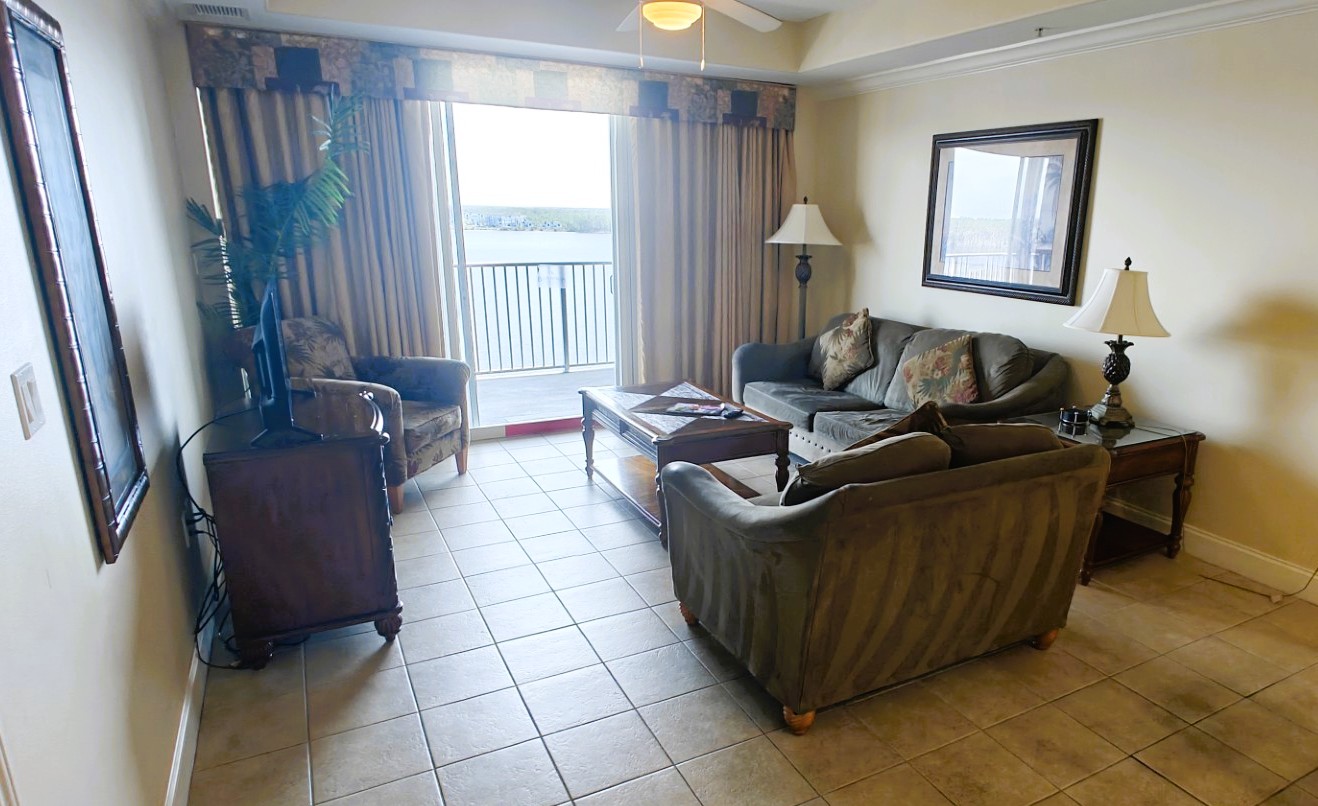 2-705 living room Two Bedroom Suite Sunrise View updated 10th floor condo with lakefront main bedroom. 2 KING beds and bunks